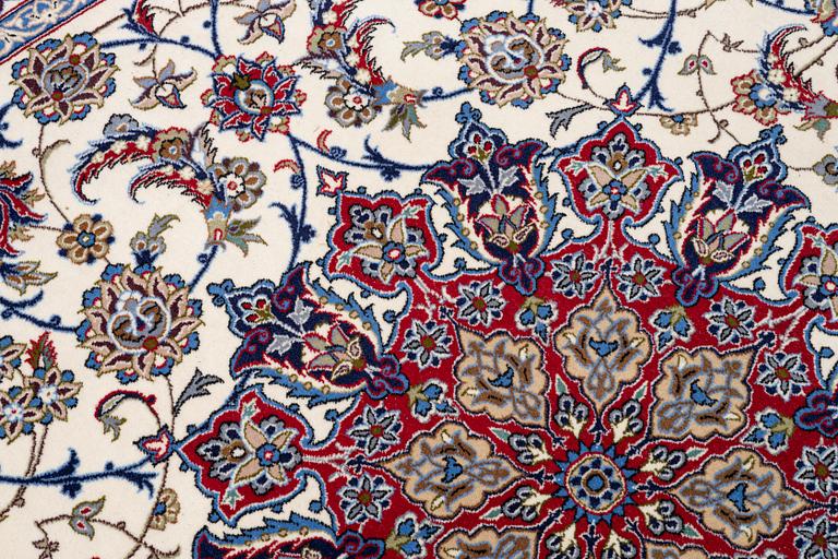 An oriental carpet, c. 310 x 200 cm.