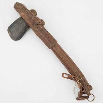 A set of three ceremonial Asmat axes and a sculpture object, Jakarta, Indonesia, 20th Century.