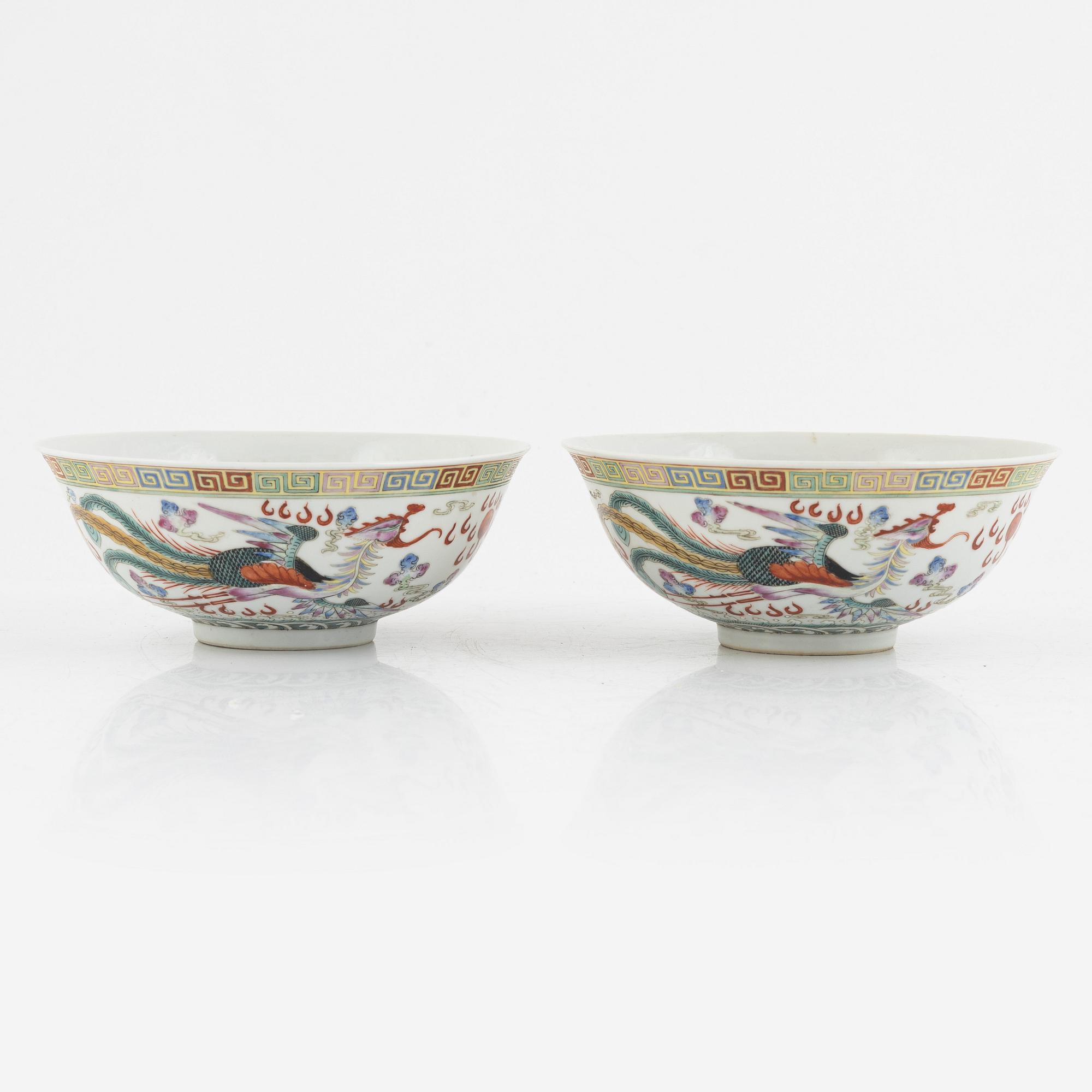 A pair of dragon and phoenix bowls, China, Republic with Qianlong mark.