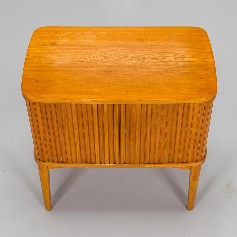 A mid-20th century radio cabinet.