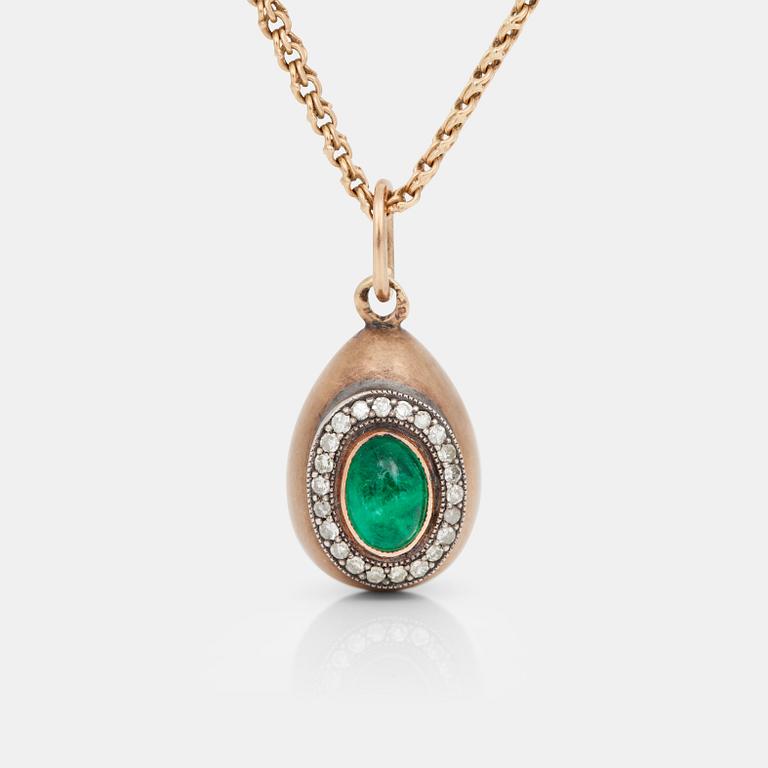 A necklace with a pendant in the shape of an egg set with an emerald and diamonds. Russia 1899 - 1908.