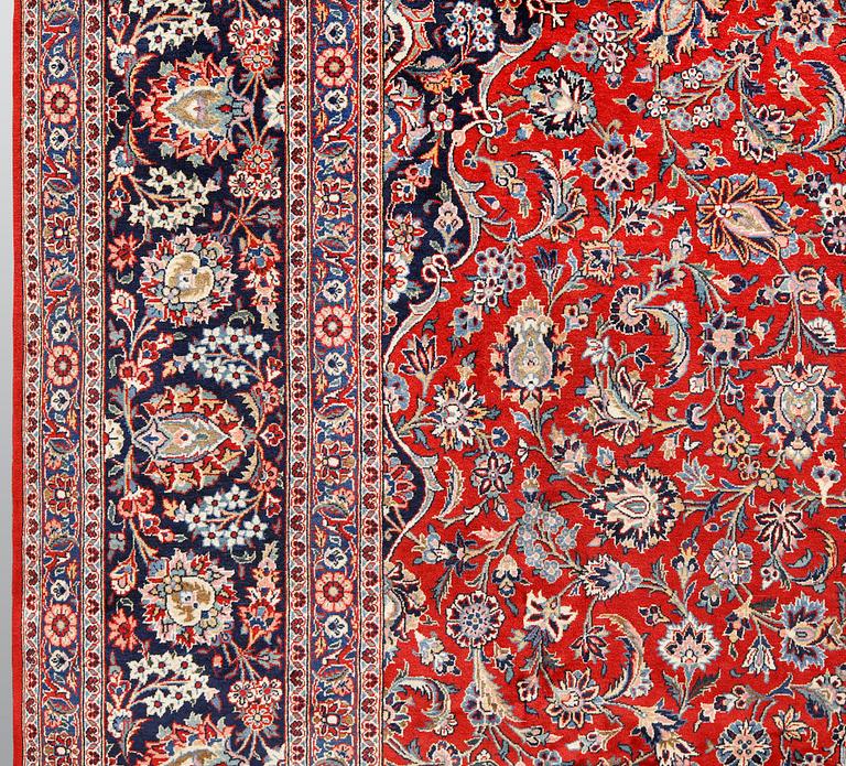 Carpet, Keshan, semi-antique, signed, 439 x 316 cm.