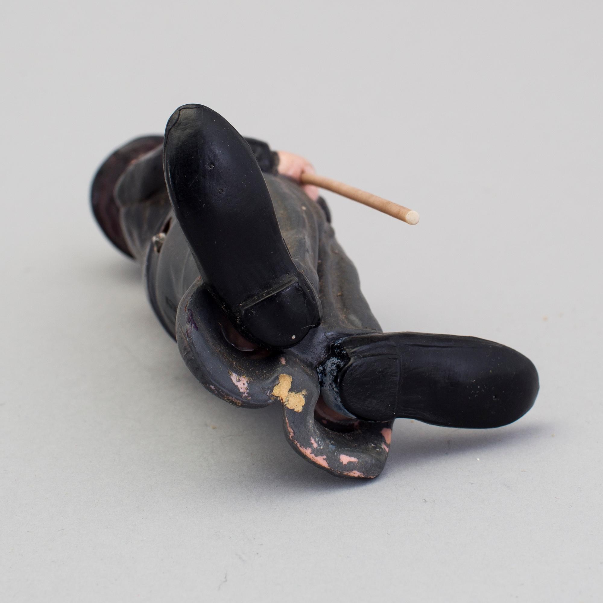 A Charlie Chaplin mechanical celluloid figure, Germany, 1920/30s.