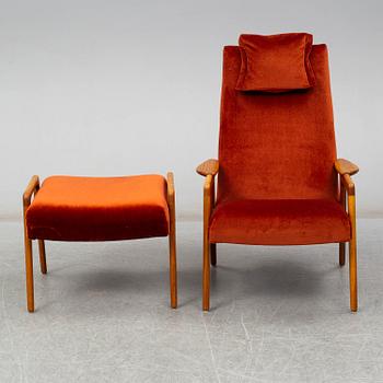 YNGVE EKSTRÖM, a 'Ruster' easy chair with foot rest.