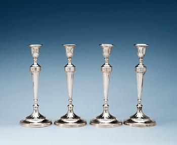 727. A set of four English 18th century silver candlesticks, makers mark of John Green & Co., Sheffield 1795.