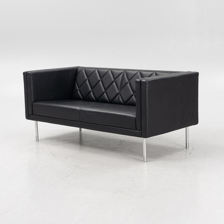 A leather upholstered sofa, 21st Century.