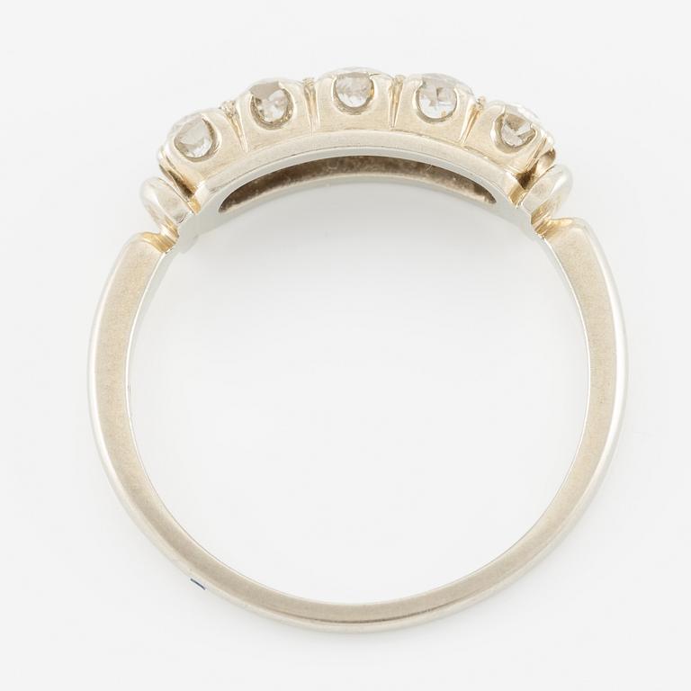 Ring in 18K white gold set with five old-cut diamonds.