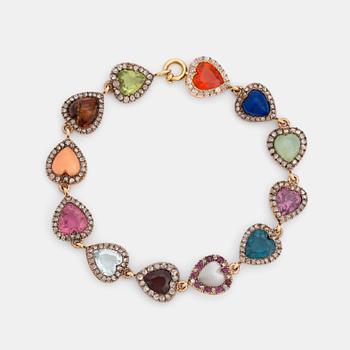 804. A BRACELET set with coloured stones and rose-cut and old-cut diamonds.