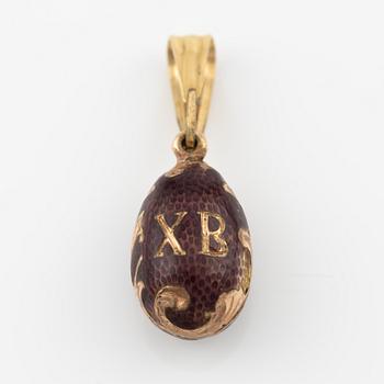 Pendant, egg, gold and purple enamel.