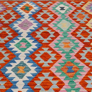 A kelim rug, 291 x 210 cm.