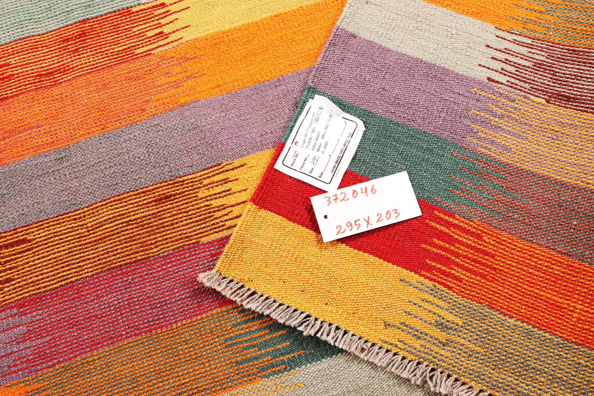 A Kilim carpet, c. 295 x 203 cm.