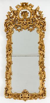 A late 19th century rococo style mirror abd console table.