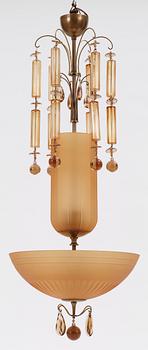 A 1920-30's glass and brass ceiling lamp.