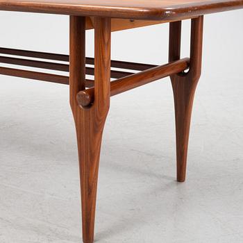 A Scandinavian teak coffee table.