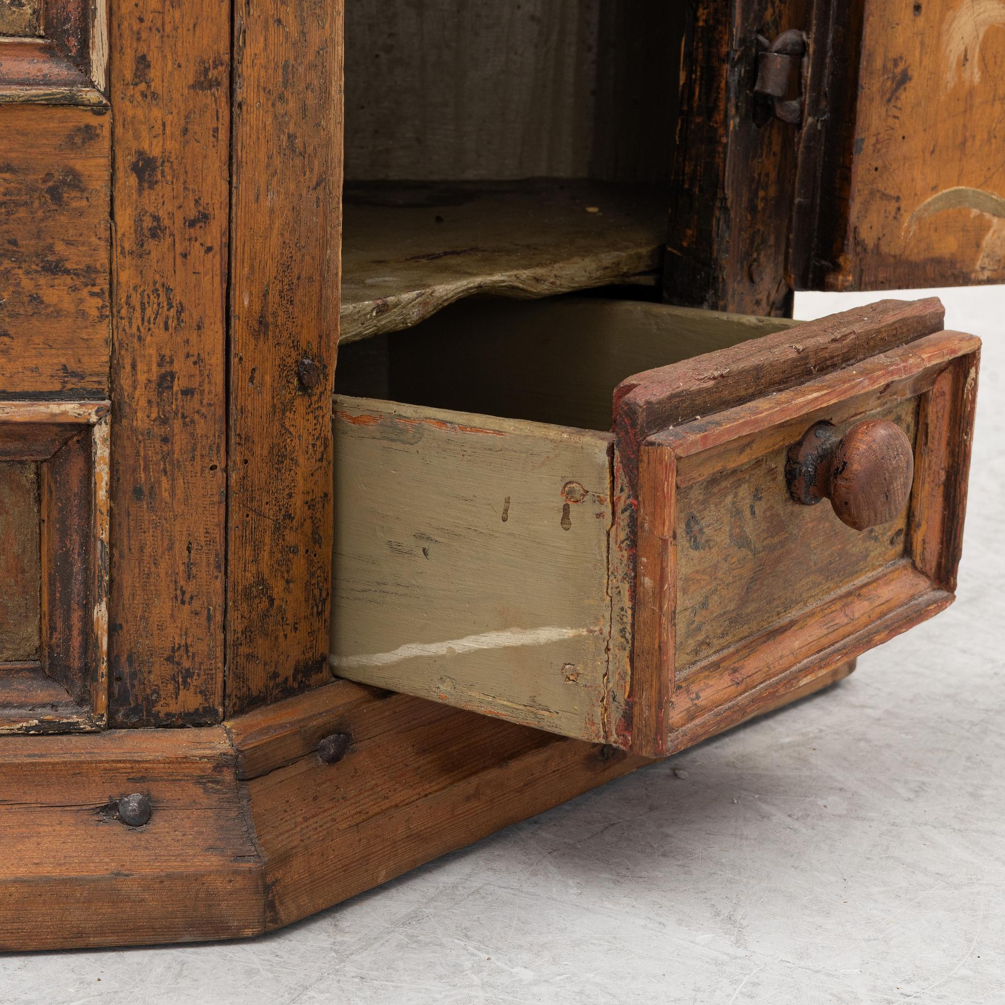 A wall cabinet, folk art, Västergötland dated 1773.