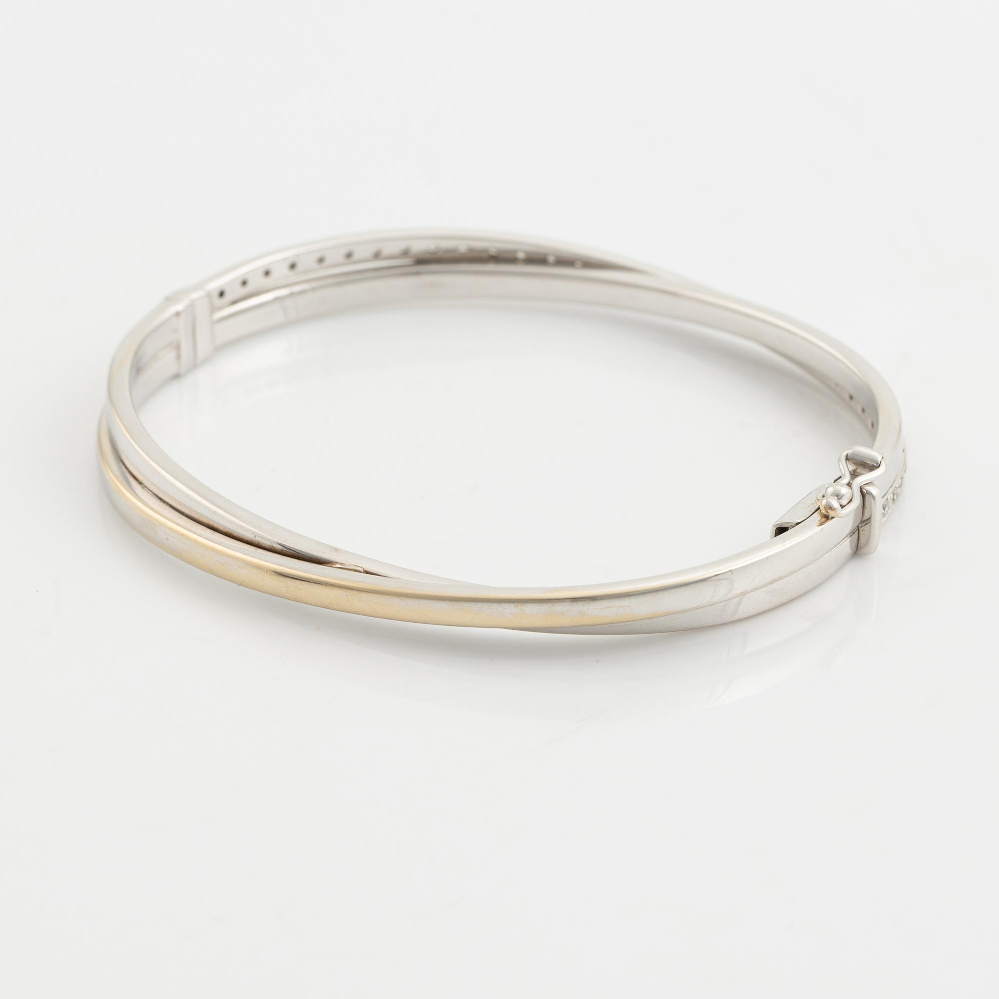 Armlänk, 18K vitguld med briljantslipade diamanter.