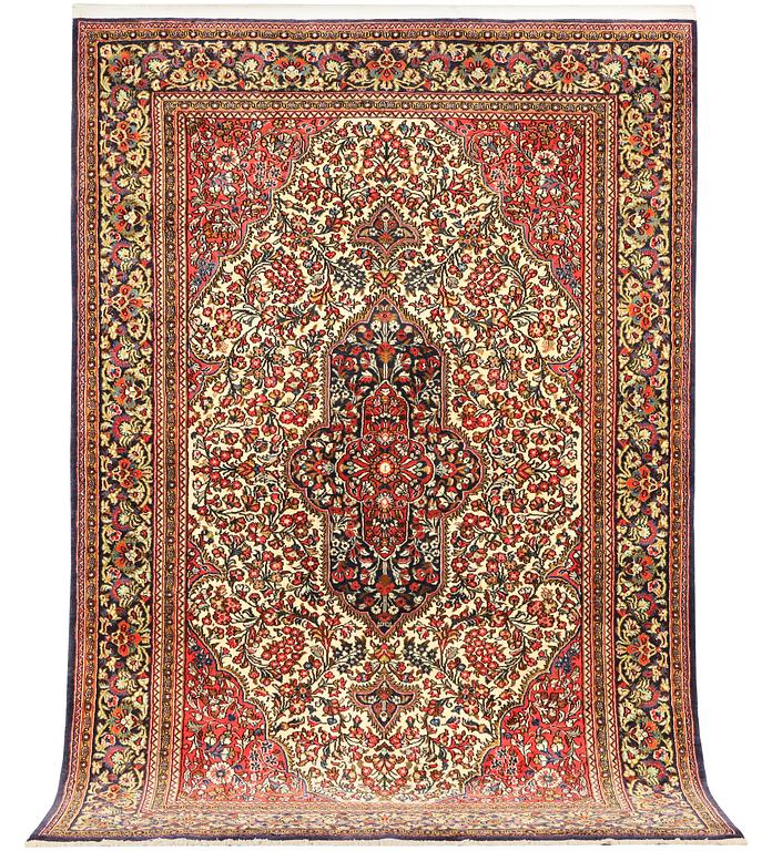 A Ghom rug, c. 202 x 137 cm.