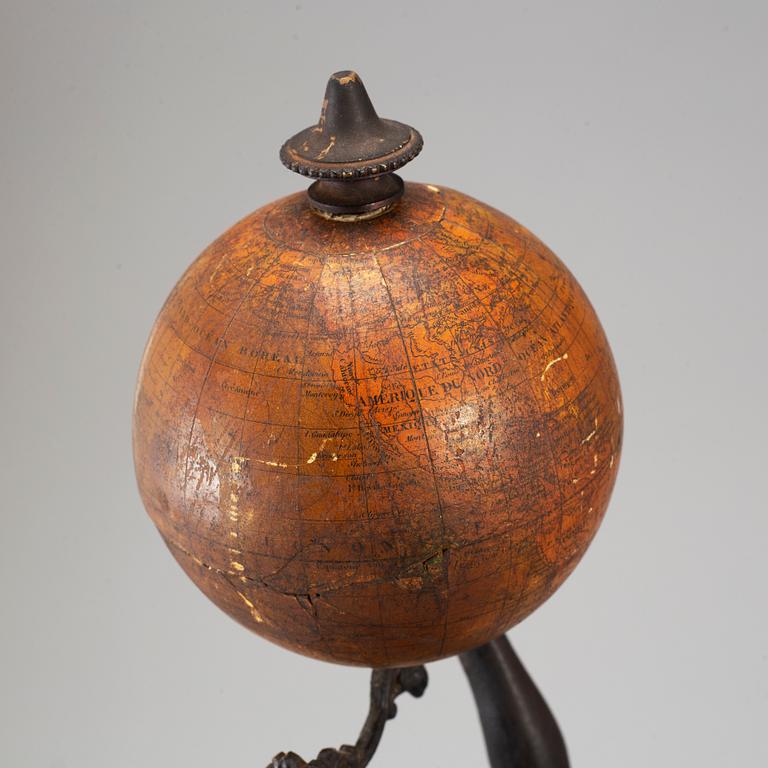 UNKNOWN ARTIST,SCULPTURE and A TERRESTRIAL GLOBE by E. Bertaux, Paris. Ca 1900.