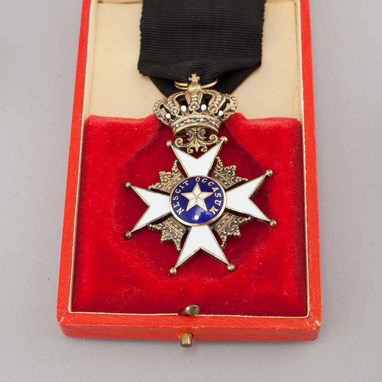 Five 20th century order crosses and star.