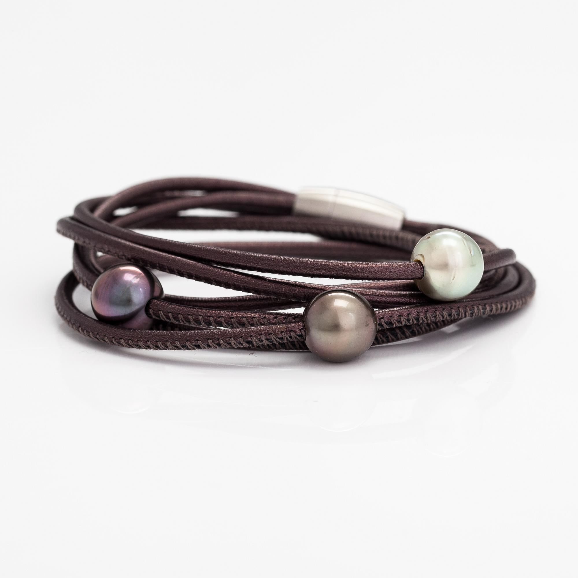 Schoeffel, A leather bracelet with cultured pearls.