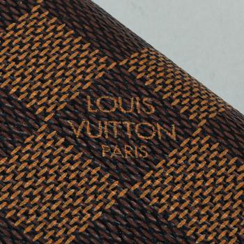 LOUIS VUITTON, a Damier Ebene 'Sarah Wallet'.