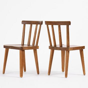 Axel Einar Hjorth, a set of six stained pine "Utö" chairs, Nordiska Kompaniet, Sweden, 1930s.