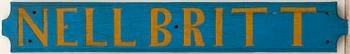 Namnskylt för båt "Nell Britt" 1900-tal.