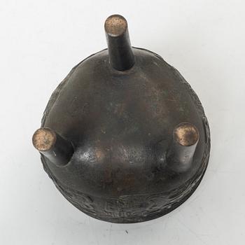 A Chinese tripod bronze censer, Ming style, Qing dynasty (1644-1912).