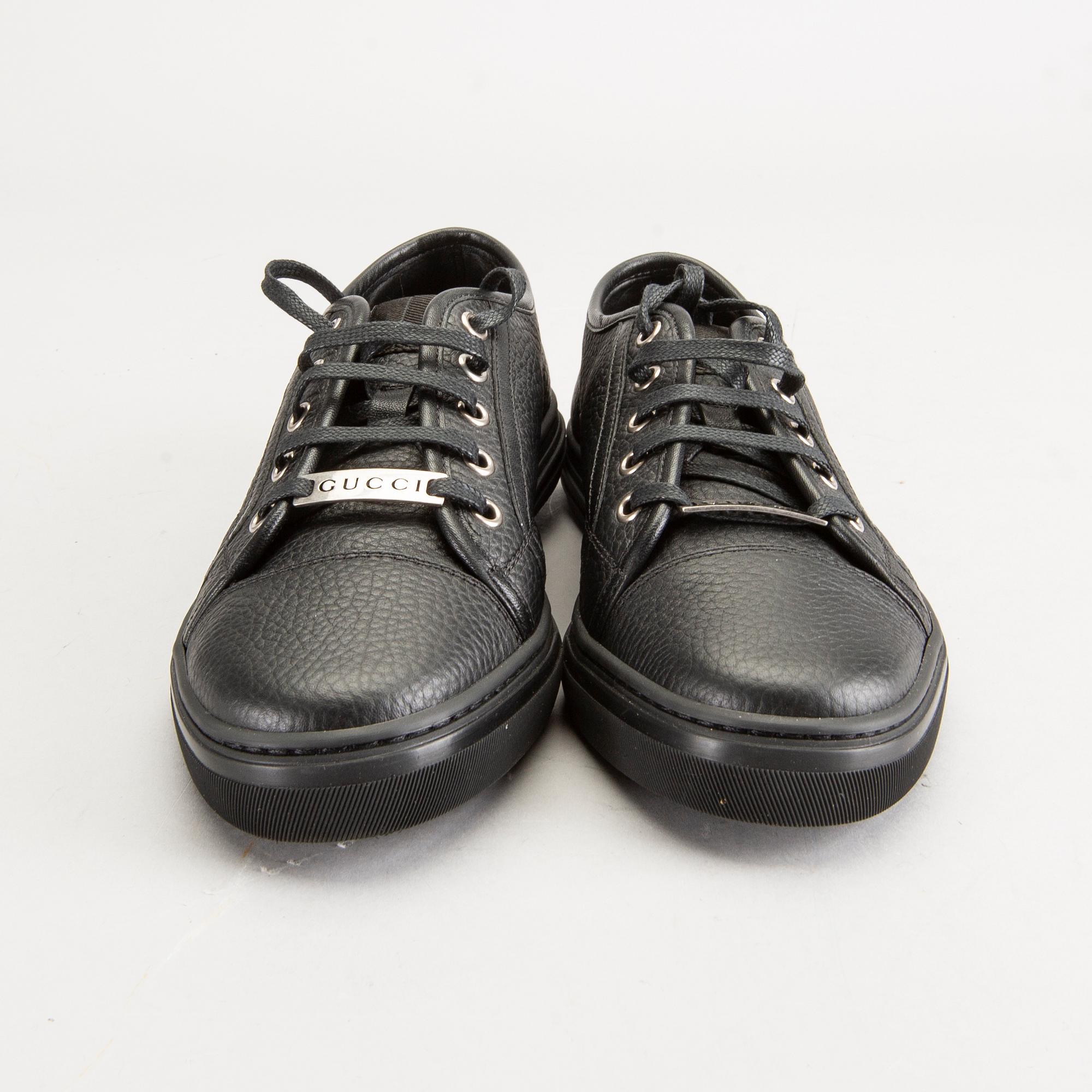 A piar of Gucci sneakers, size 37 1/2.