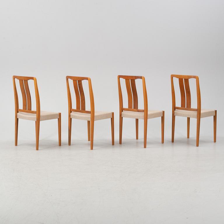 A 'Rimbo' walnut dining table and four chairs, second half of the 20th Century.