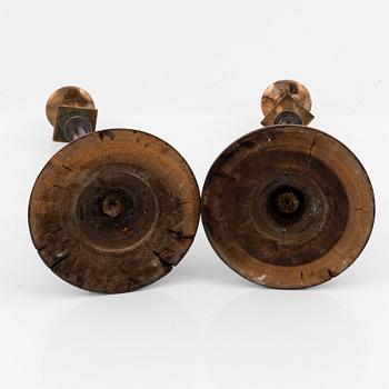 A pair of 19th century candlesticks in wood and brass and white metal.
