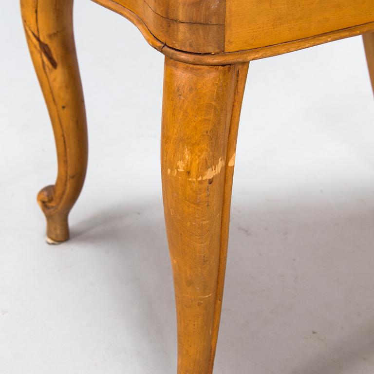 A pair of rococo revival chairs. Latter part of 19th century.