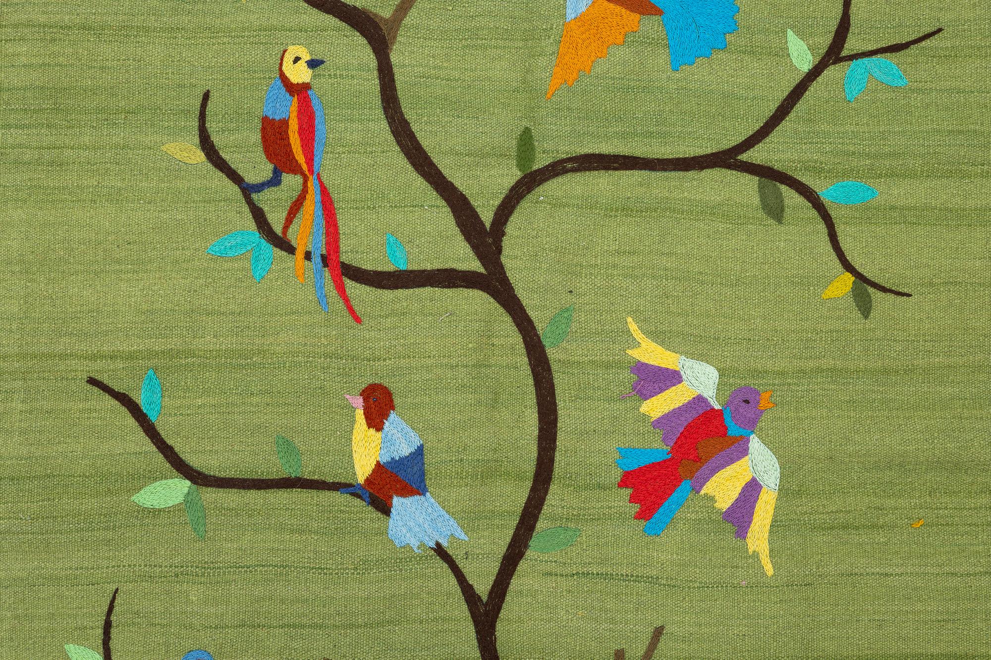 A hand-embroidered Kelim rug, 184 x 124 cm.