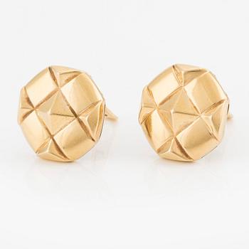 A pair of 18K gold Bulgari earrings.