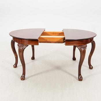 A mahogany 17 pcs Chippendale dining set first half of the 20th century.