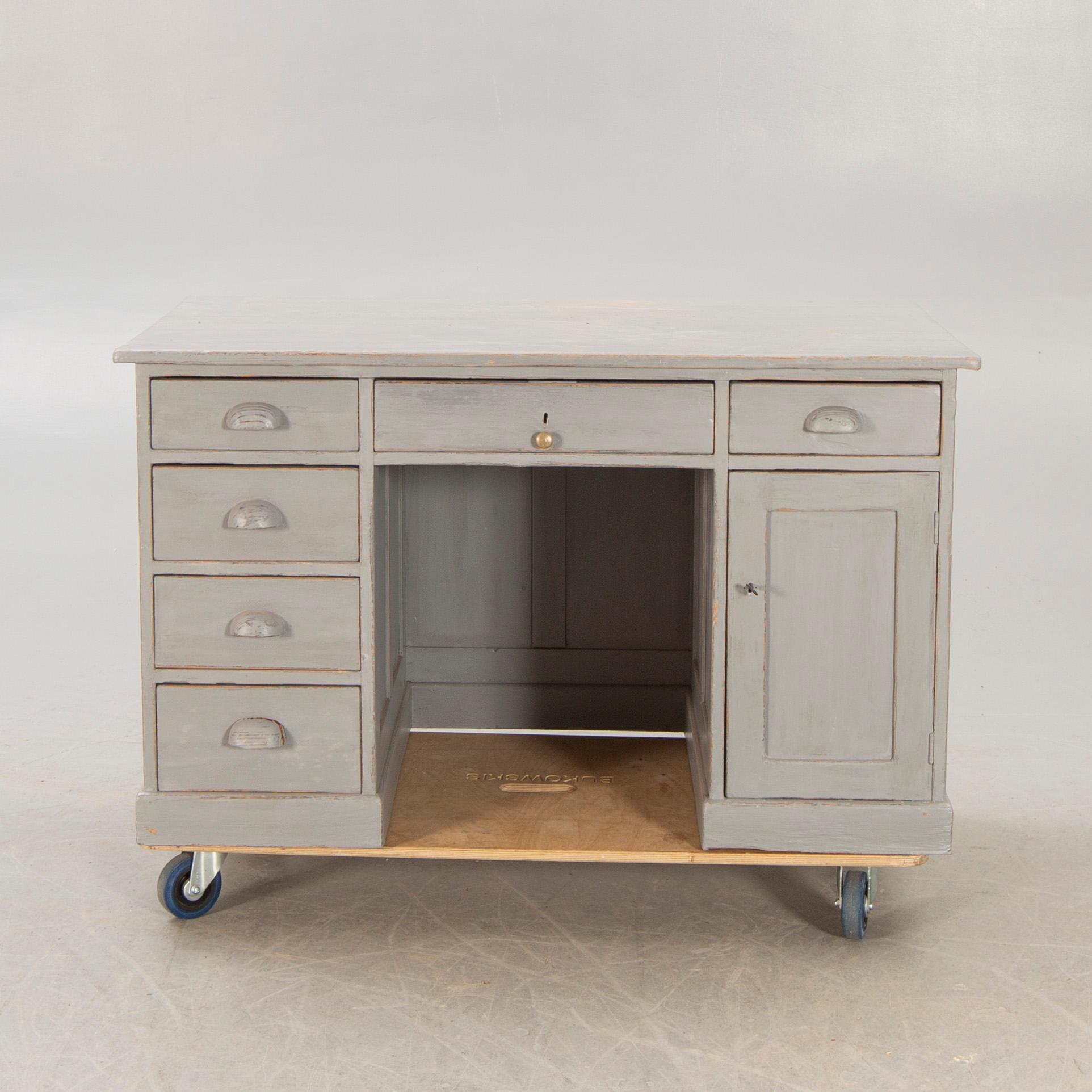 An early 1900s painted writing desk.