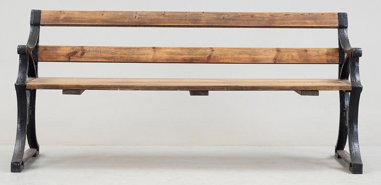 A Folke Bensow cast iron and stained wood park bench, Näfveqvarn.