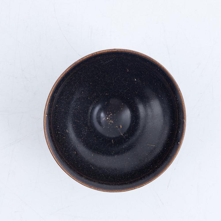 A tenmoku glazed Song style bowl, probably later.