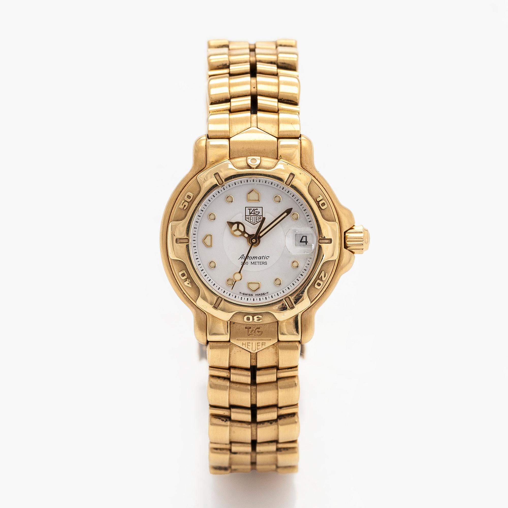 Tag Heuer, 6000 Gold, armbandsur, 28 mm.