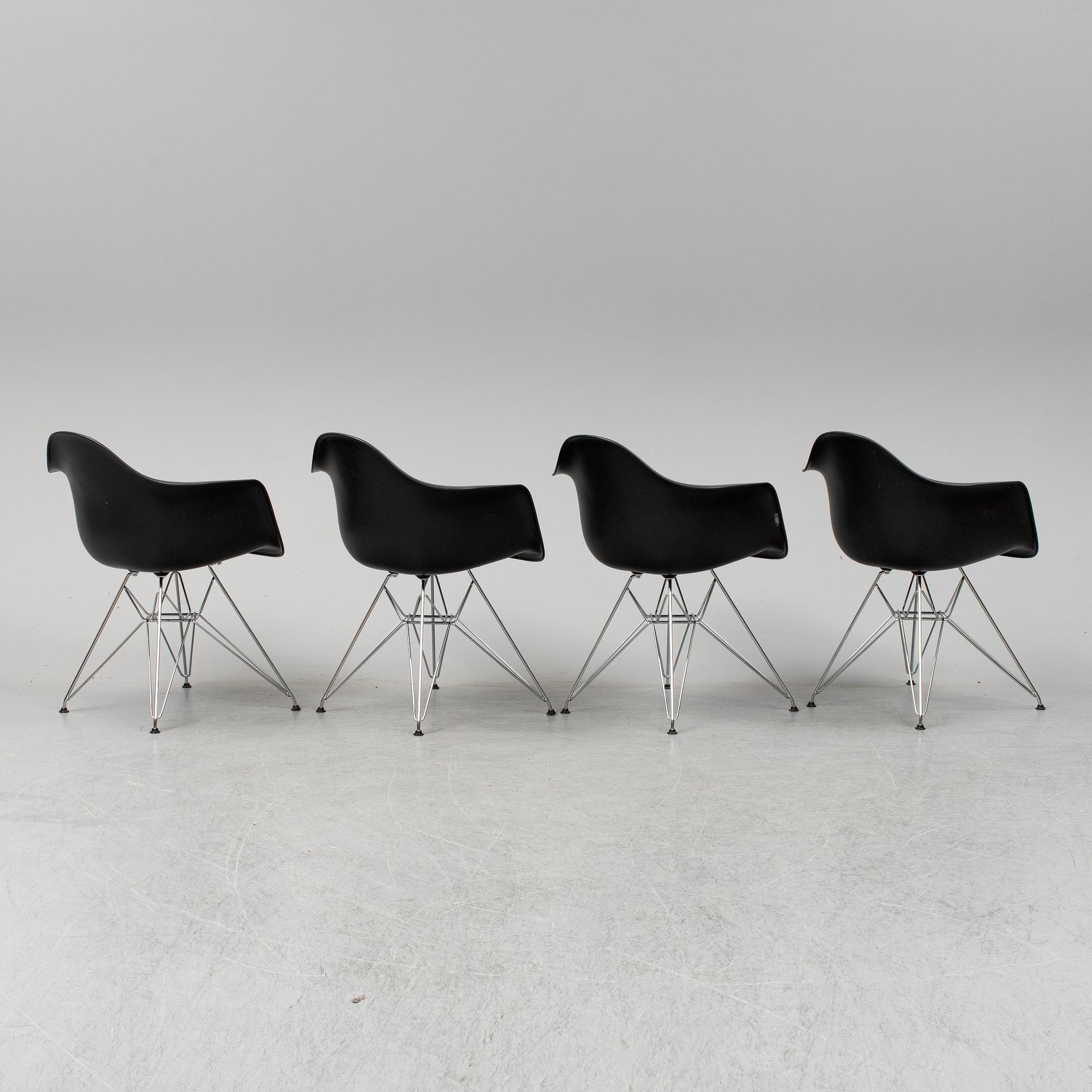 CHARLES AND RAY EAMES,  4  Eames Plastic Armchair, Vitra 2010.
