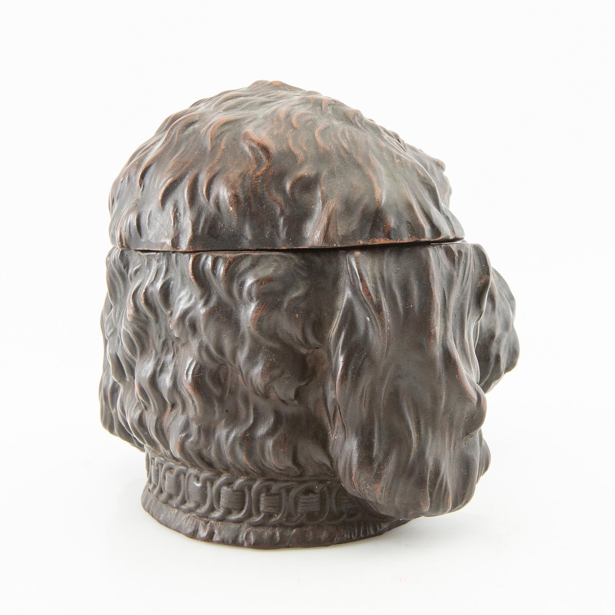 Tobacco tin, early 20th century.