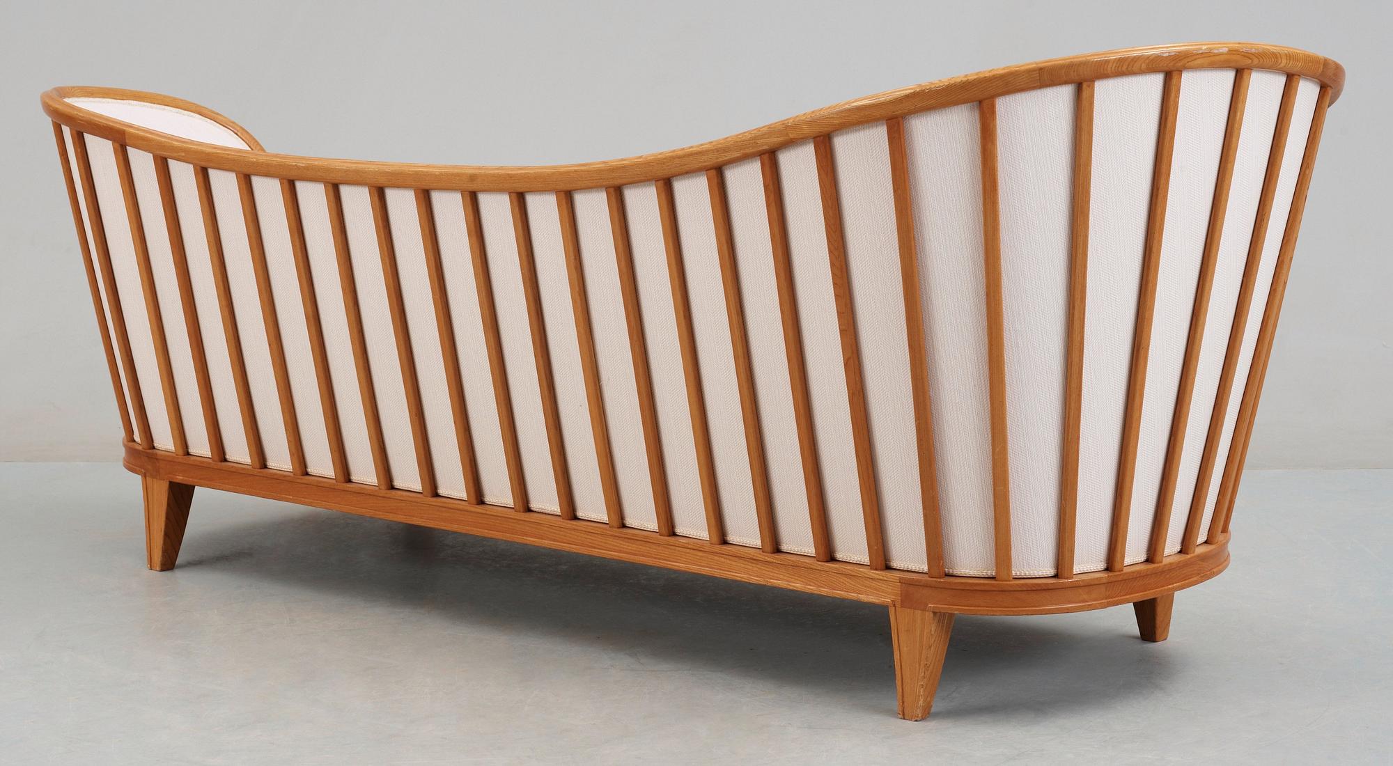 A Tom Wolfenstein elm sofa and a pair of armchairs for Ditzingers, Stockholm 1940's.