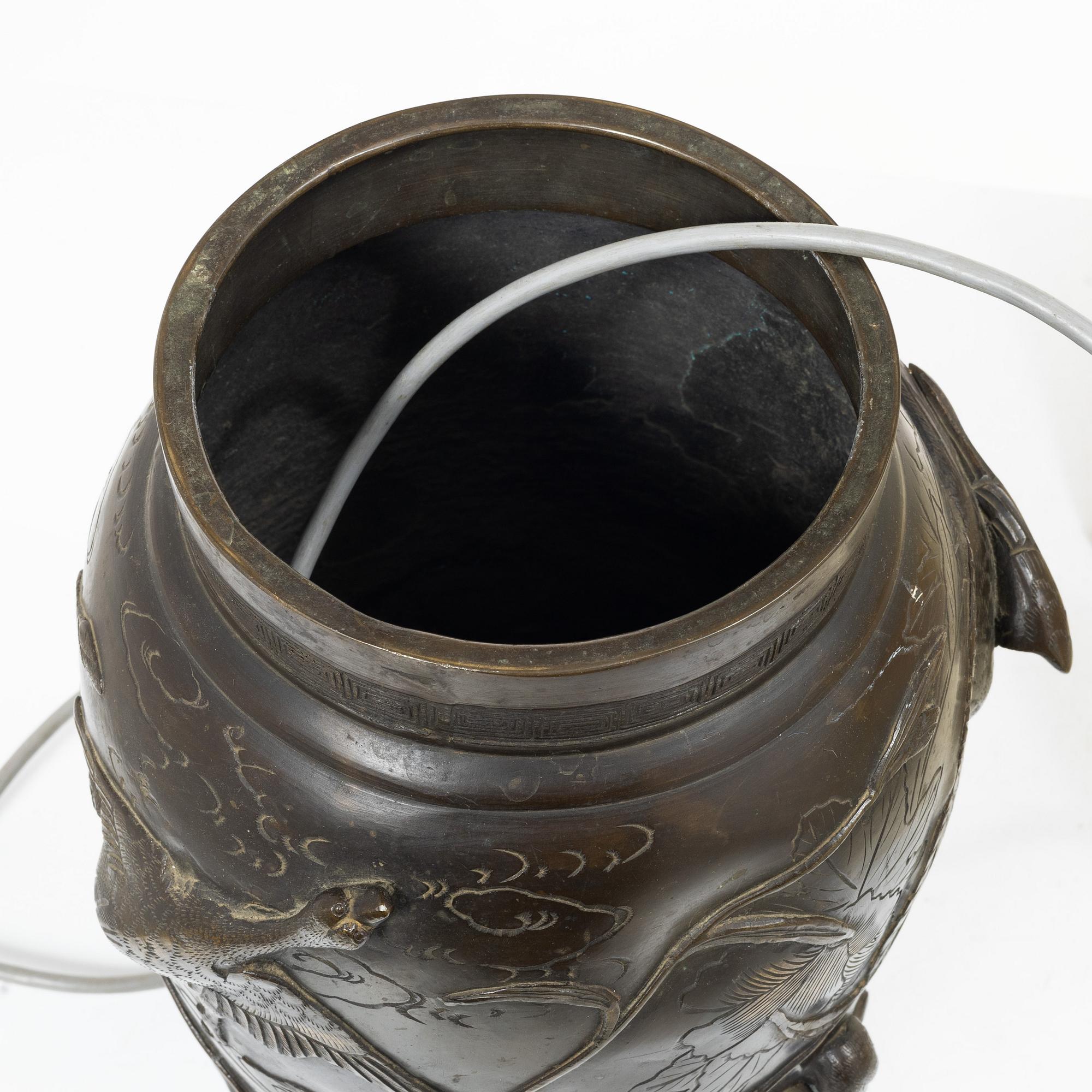 A Japanese bronze table lamp, 20th century.
