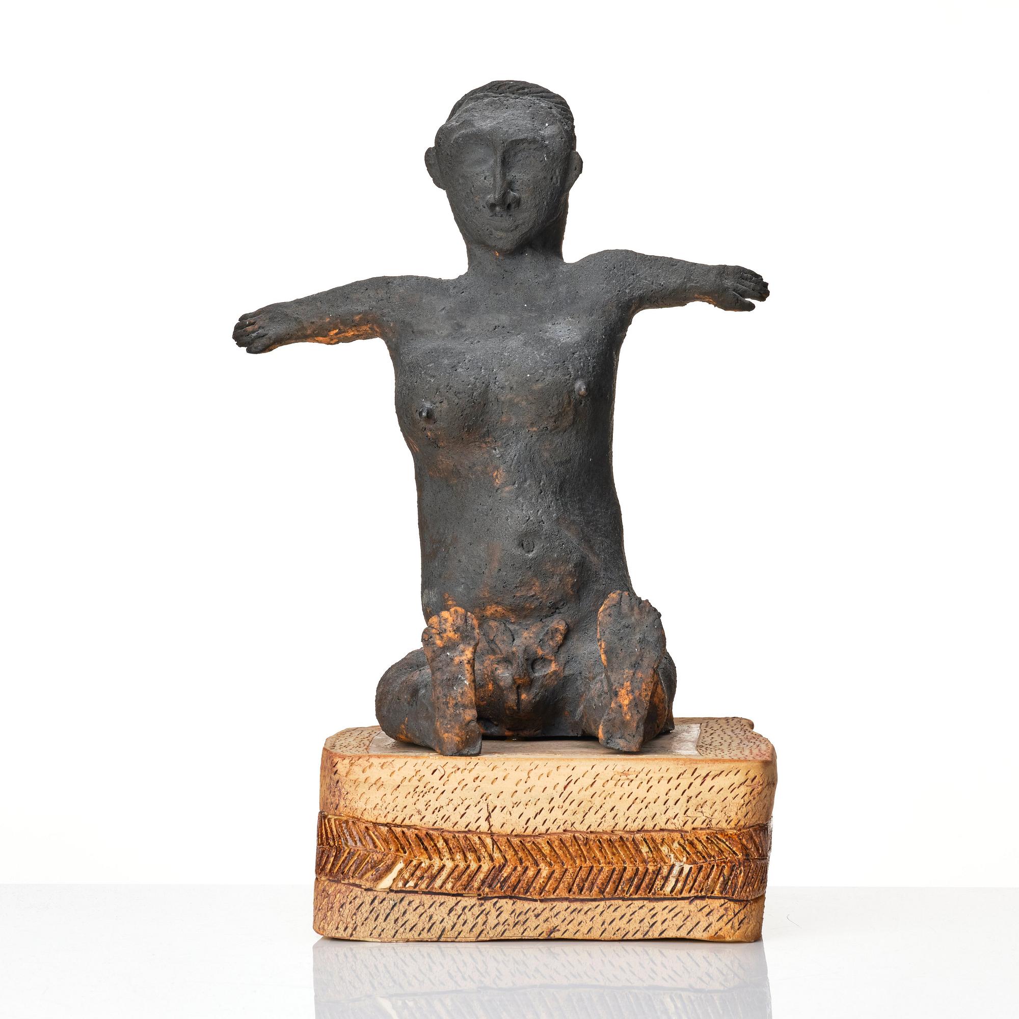 Ulrica Hydman-Vallien, a ceramic sculpture of a seated woman, Sweden, early 1970s.