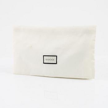 Gucci, "Dionysus chain wallet".