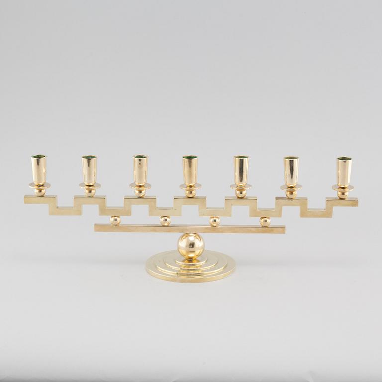 A brass candelabra, attributed to Firma Lars Holmström in Arvika, 20th cenutry.