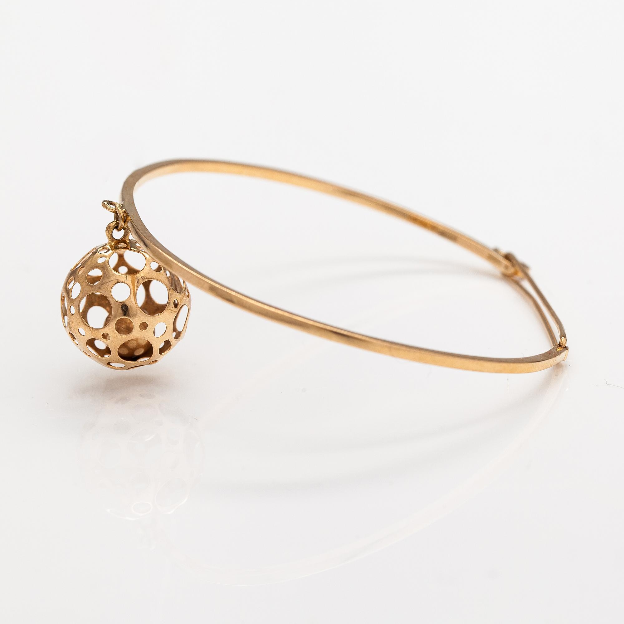 Liisa Vitali, A 14K gold bracelet "Leppäkerttu". Westerback, Helsinki 1969.