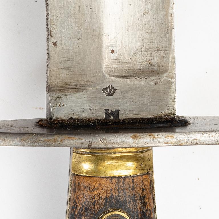 A Swedish cutlass 1810 pattern, with scabbard.