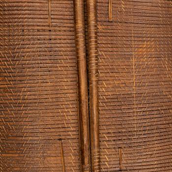 An early 20th Century rattan shield, Mongo-Ngandu, DRC.