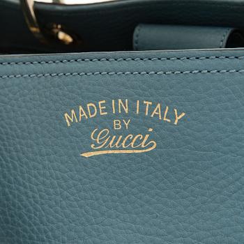 Gucci, a 'Bamboo shopper' bag.